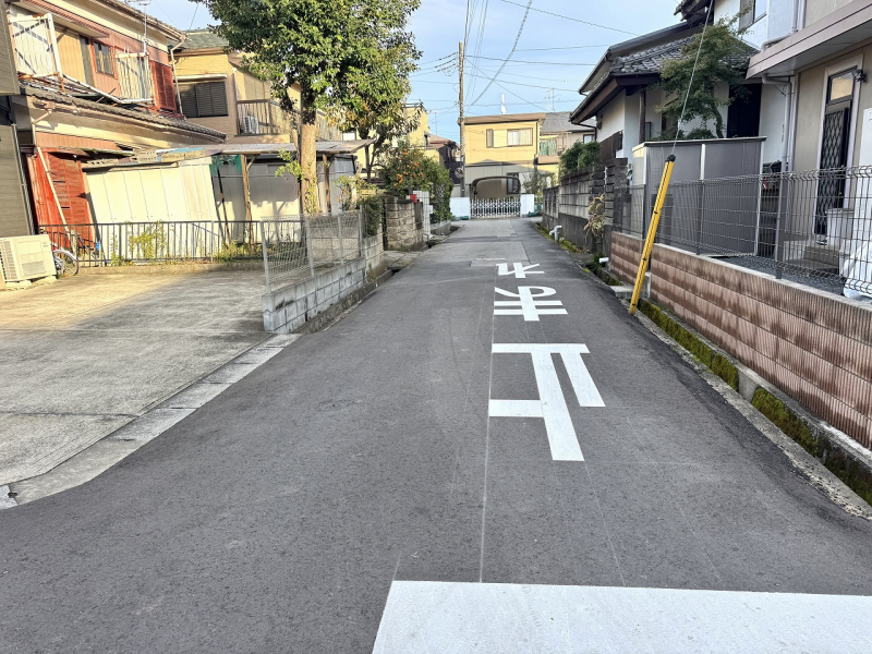 ��錧���s�g�c�g�c�̒��È�ˌ��Ă̑O�ʓ��H�܂ތ��n�ʐ^